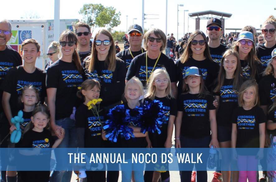 A group of participants for the NOCO DS Walk with the text THE ANNUAL NOCO DS WALK