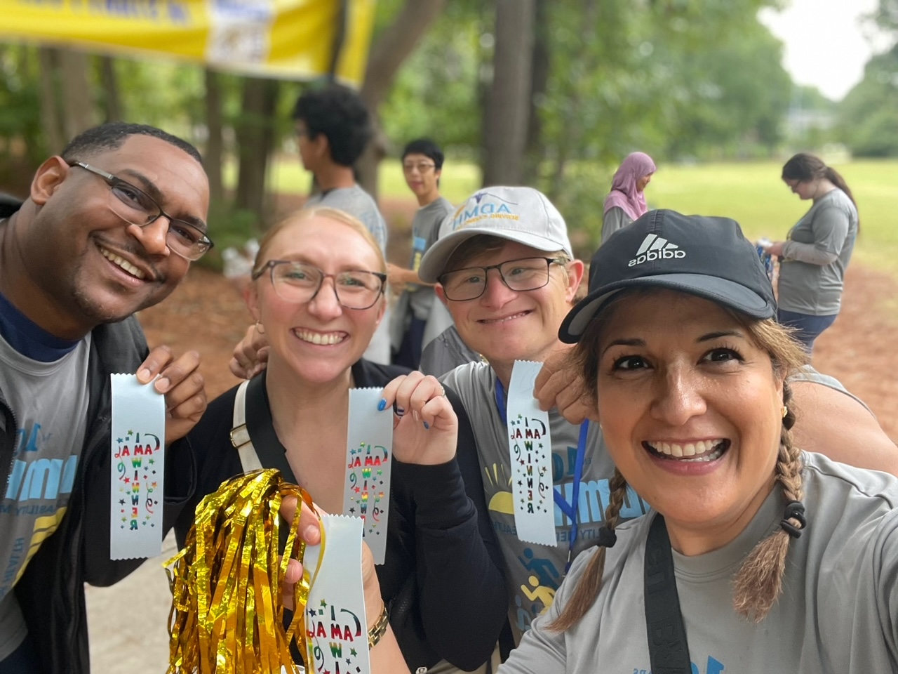 DS-Connect® and NIH team members posing with a race participant