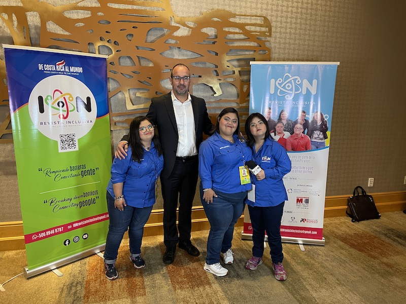 Dr. Joaquin Espinosa with self advocates at the 2024 NDSC Convention